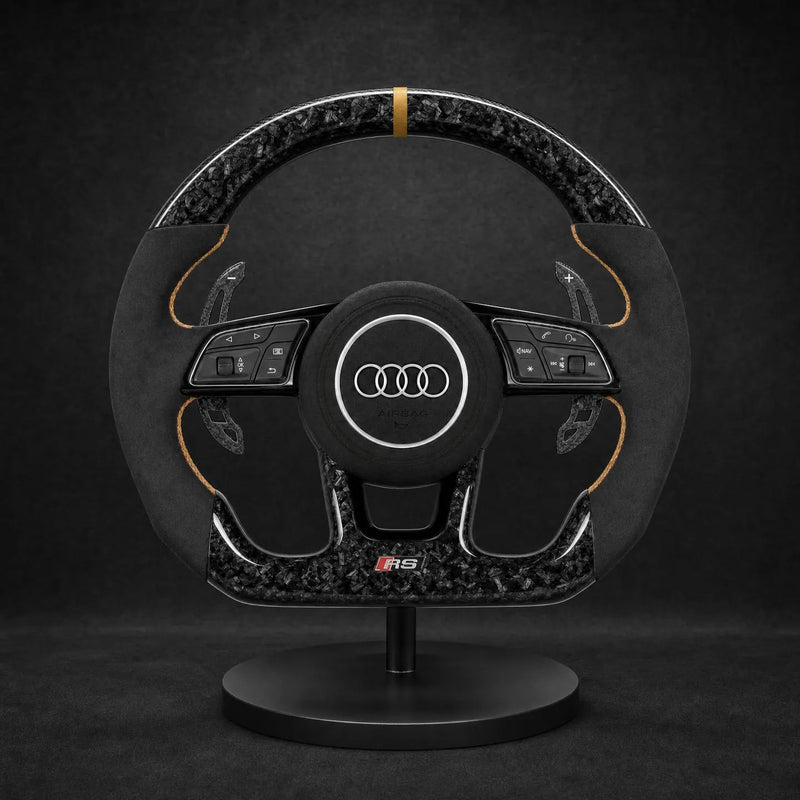 Volant personnalisé Audi alcantara gris coutures bleues et carbone 3K — vue face — volant sur mesure Apex Studio