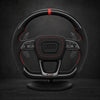 Volant personnalisé Audi alcantara noir coutures rouges et carbone 3K — vue face