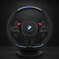 Volant personnalisé BMW Série G LCI carbone forgé inserts bleus, bande chrome, grips Alcantara noir